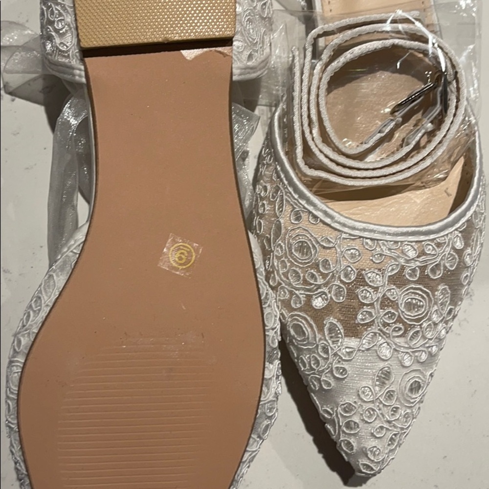 White flats with lace detail and sheer ribbon. - Picture 3 of 3